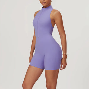 Weekend Jumpsuit in Lavender – high-neck jumpsuit with a front zip, short length, and crisscross back – Hype Harmony
