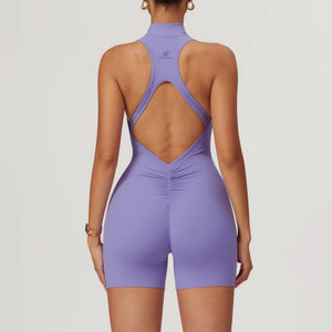 Weekend Jumpsuit in Lavender – high-neck jumpsuit with a front zip, short length, and crisscross back – Hype Harmony