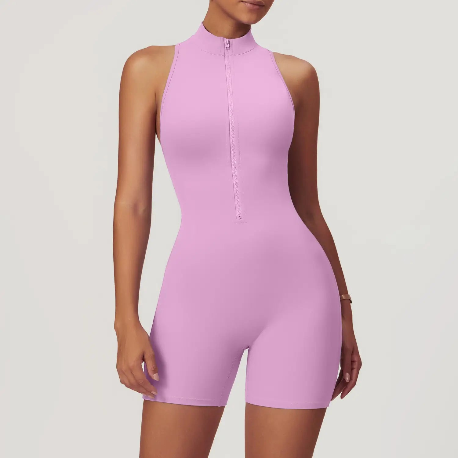 Weekend Jumpsuit in Powder Pink – high-neck jumpsuit with a front zip, short length, and crisscross back – Hype Harmony